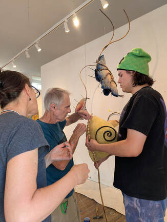 Picture, hanging artwork for a show